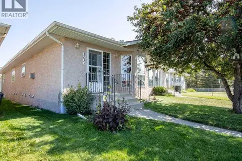 303B Centre Street N