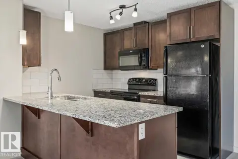 #230 6076 SCHONSEE WY NW