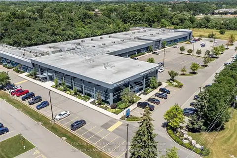 1075 North Service Road W 100